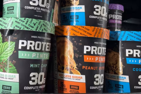 Colorful containers of "high protein" ice cream
