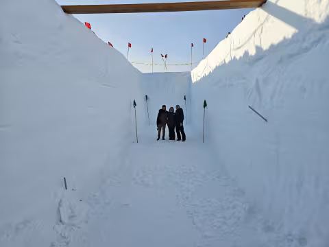 The team standing in the research trench.